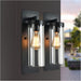 Nordic industrial exterior wall light with clear glass cylinder, matte black, IP44